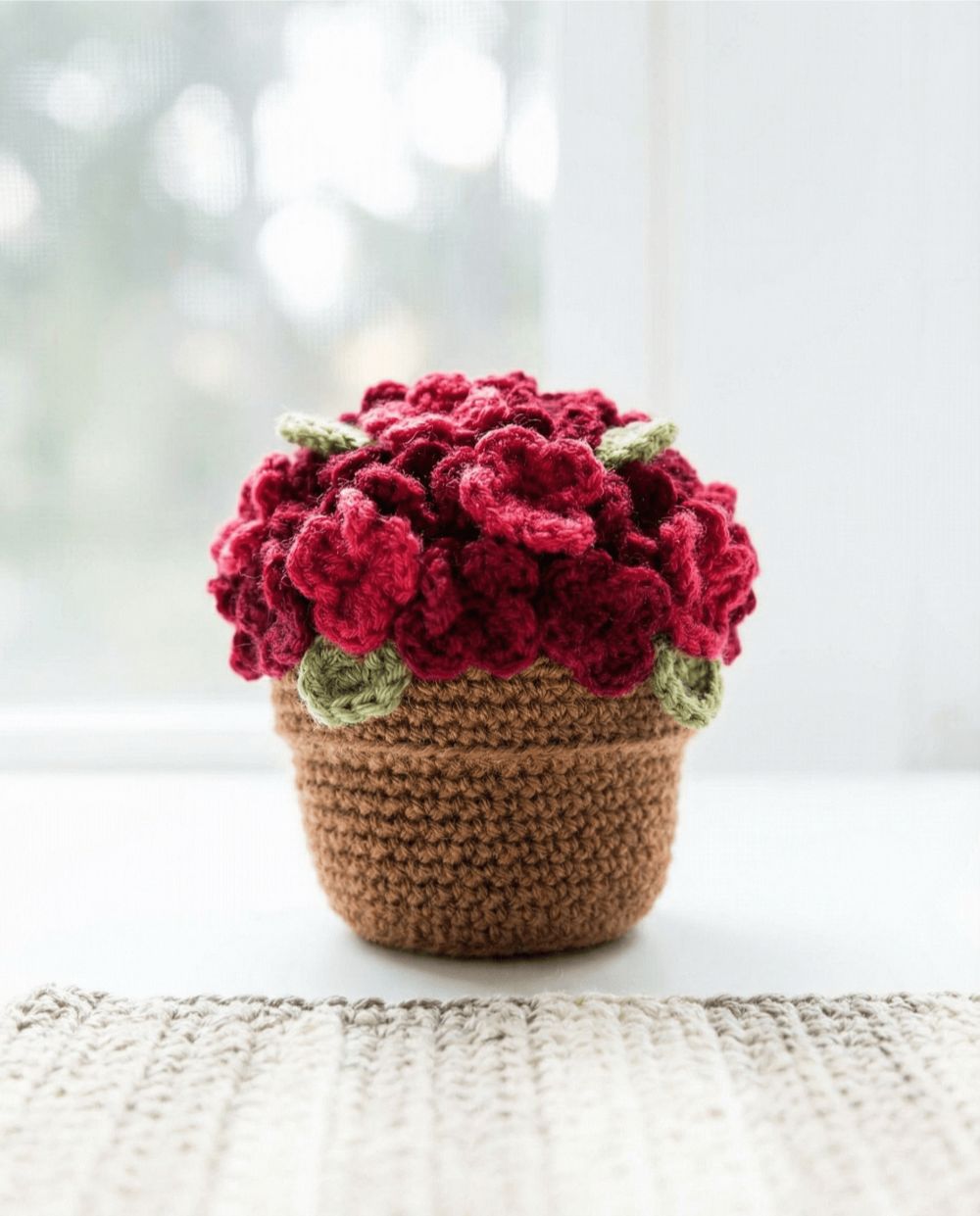 Textured crochet flower pot with detailed stitchwork