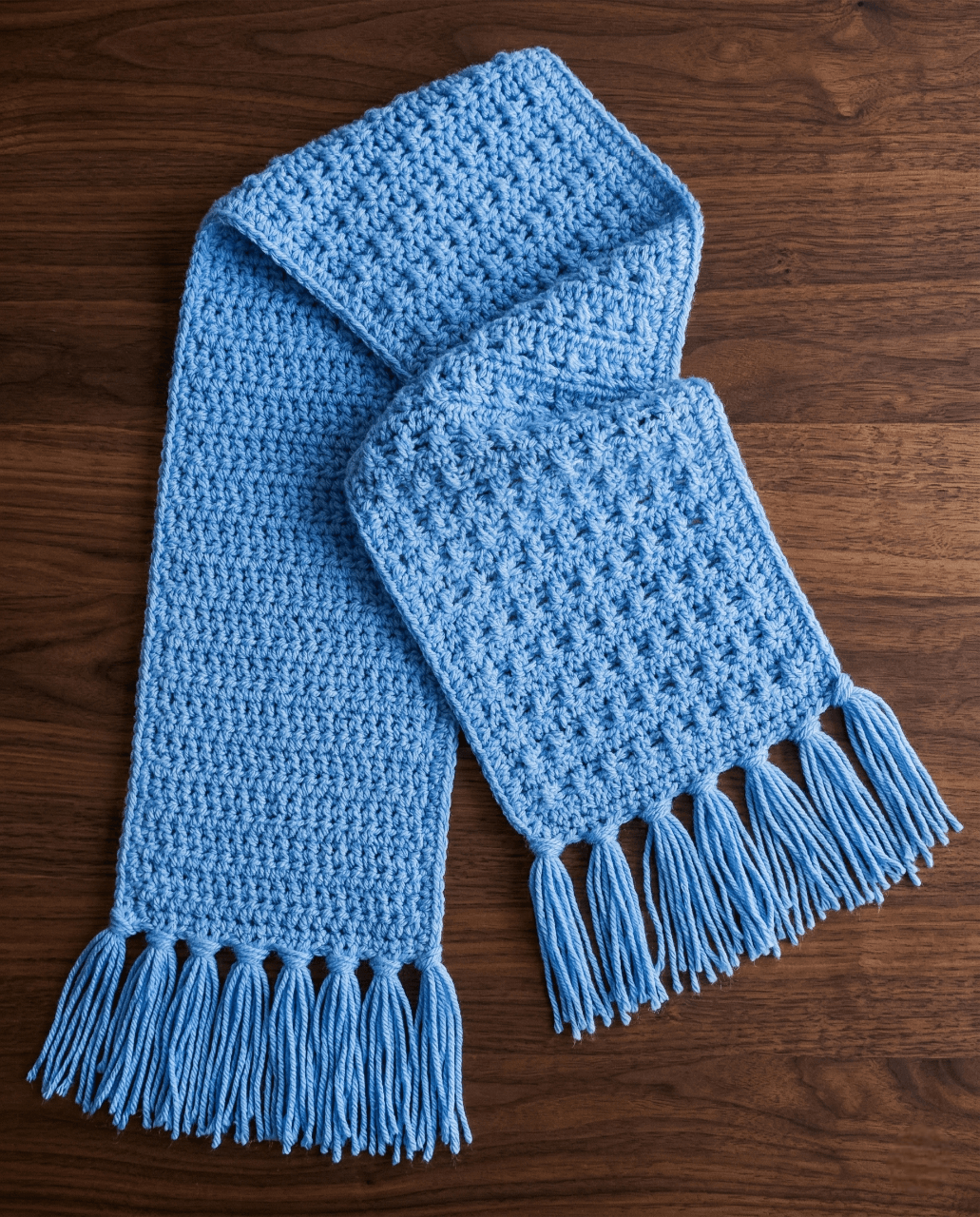Blue crochet scarf with chunky fringe tassels