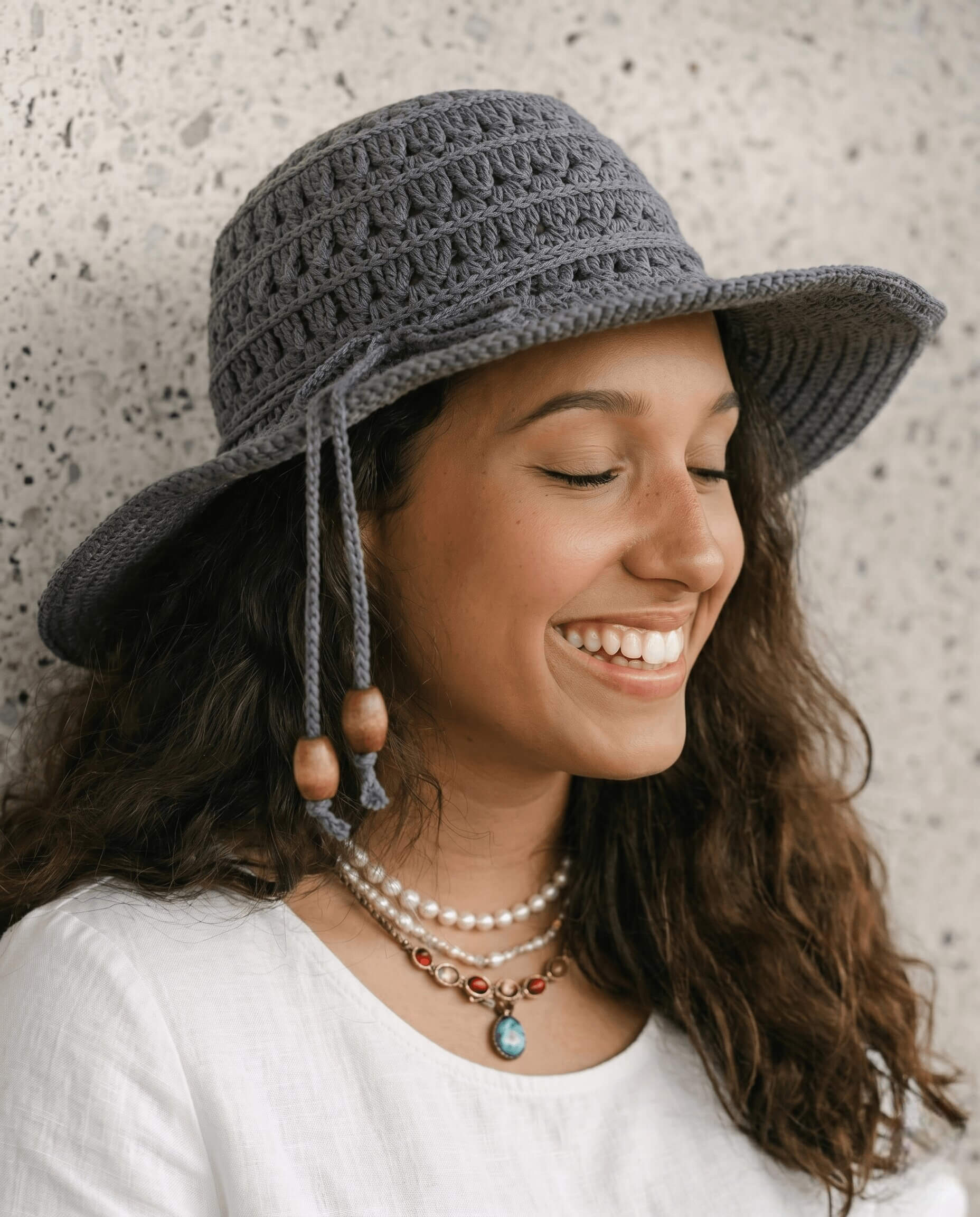 Petals Sun Hat with a petal inspired openwork stitch pattern in natural cotton
