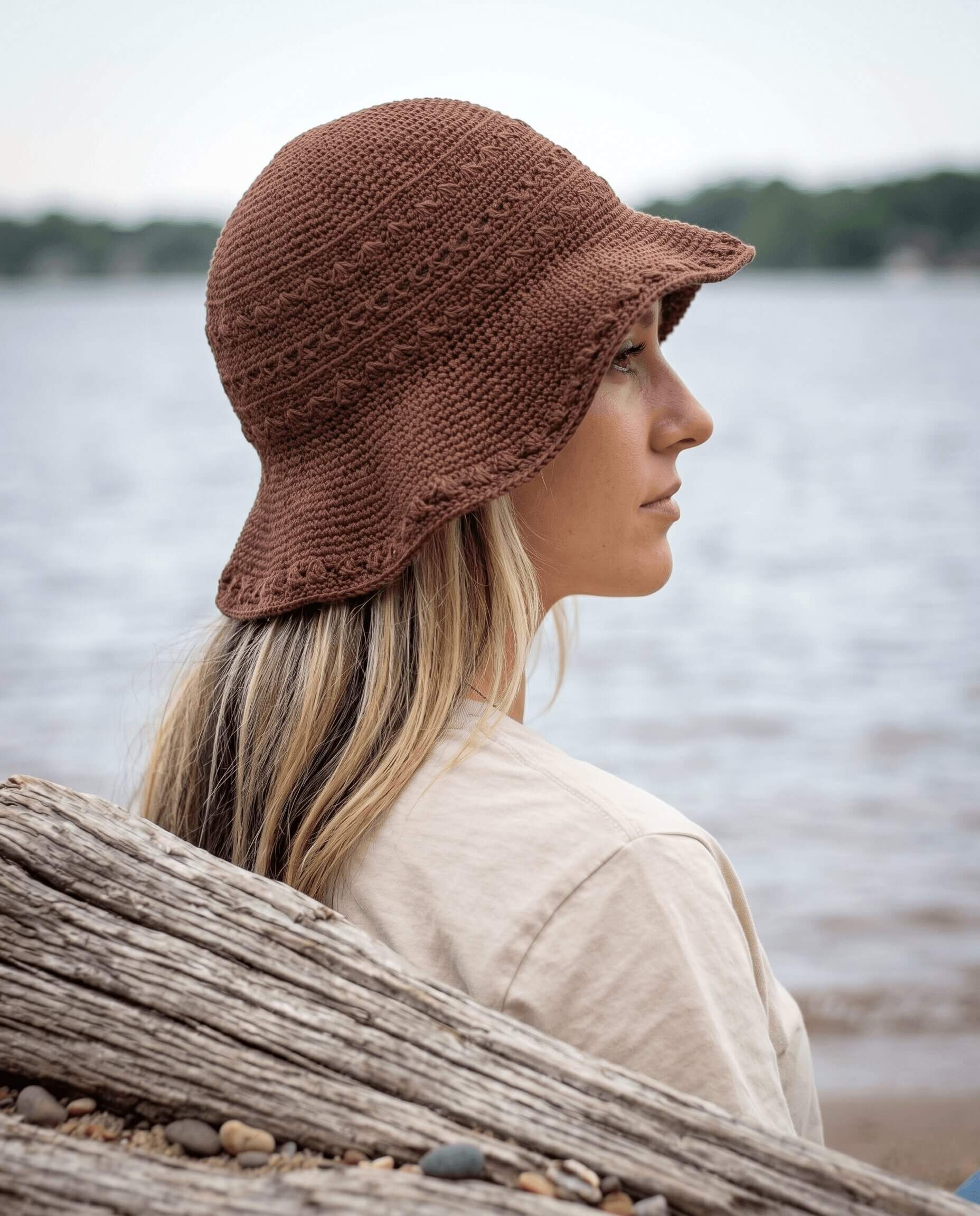 Seaside Sun Hat in coffee colored cotton yarn with a relaxed wide brim and cable stitch detail
