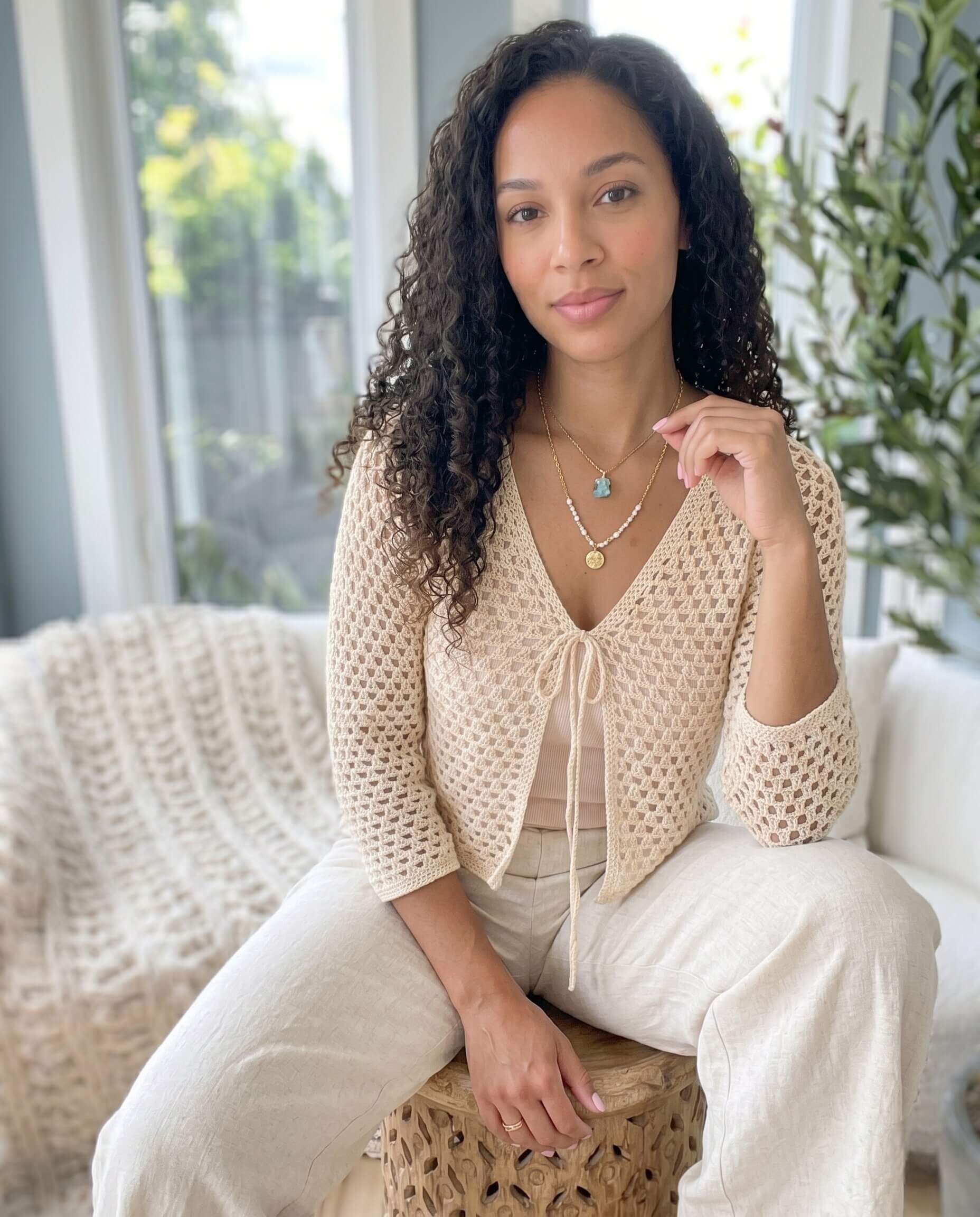 V-Stitch Summer Cardigan in soft white cotton yarn, styled with a tie front